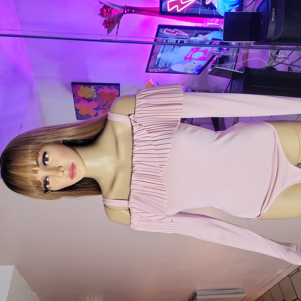 Beautiful pink guess shirt. Snap on bottom.
